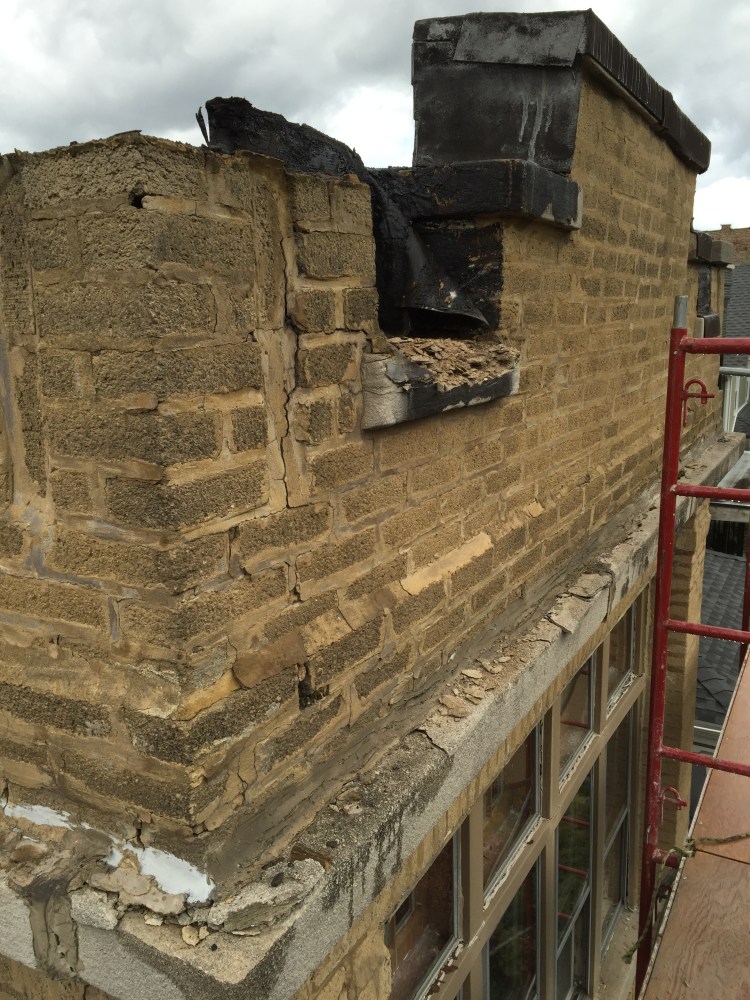 Masonry parapet wall reconstructions